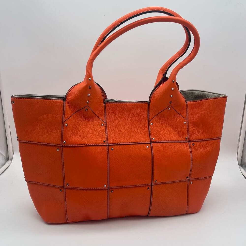 OrYany Studded Patchwork Pebbled Leather Tote Bag orange NEW w/o tags.